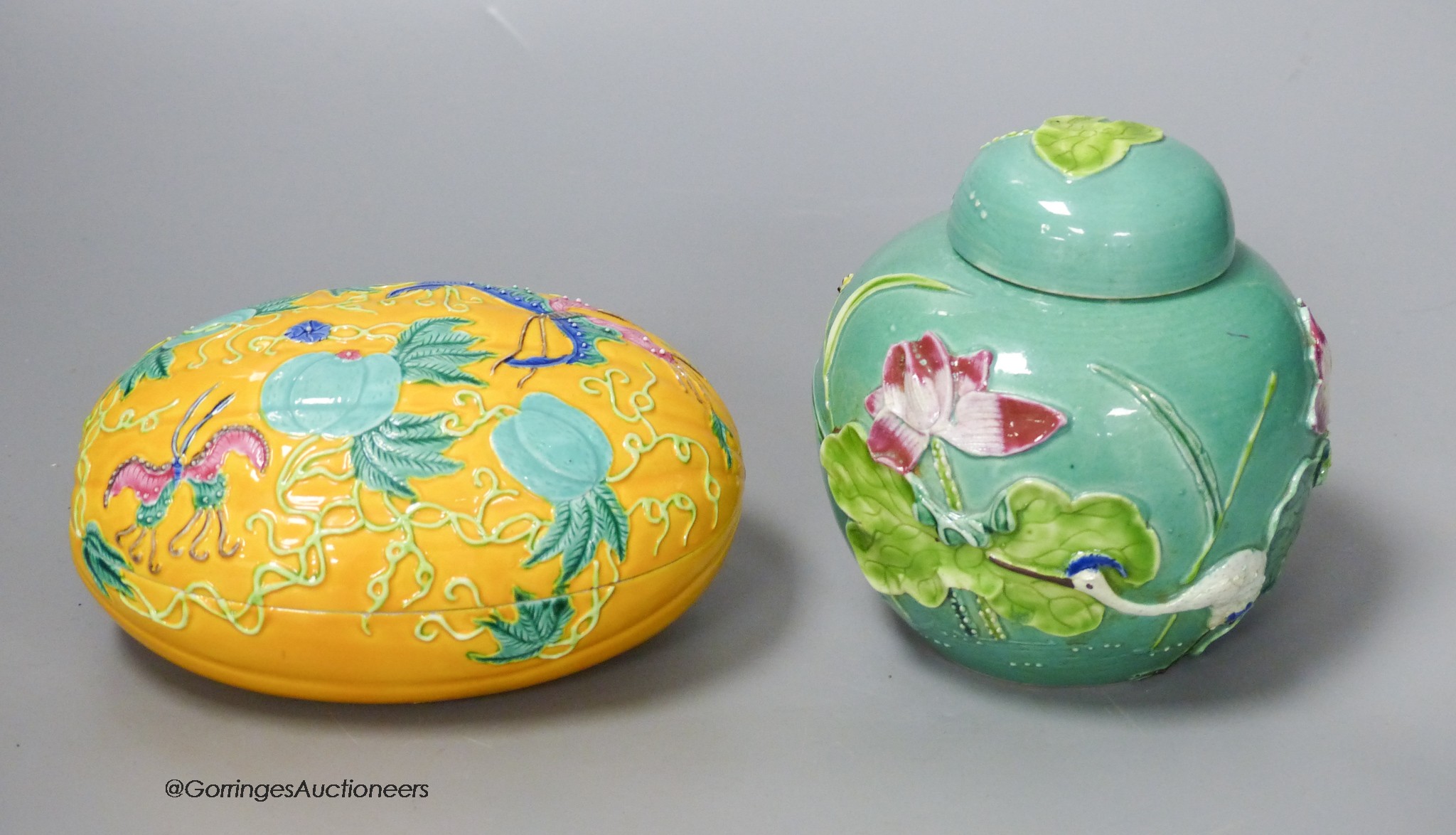 A Chinese polychrome glazed jar and cover and a similar box and cover, tallest 11cm